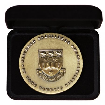 Auckland Uni Research Excellence Award Coin
